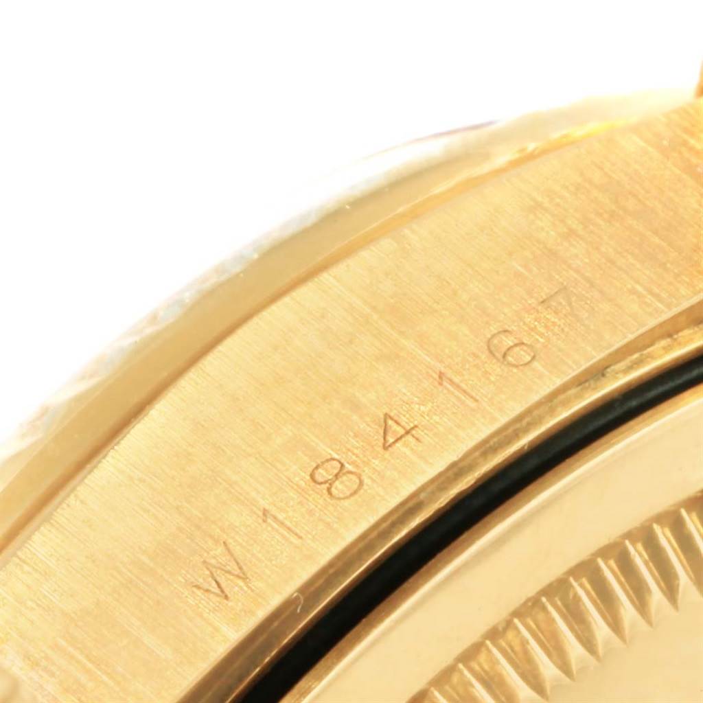 This image shows a close-up view of the Rolex President 18238 Men's Yellow Gold Champagne Dial 18238 Men's Yellow Gold Champagne Dial model watch focusing on the mid-case with a visible serial number.