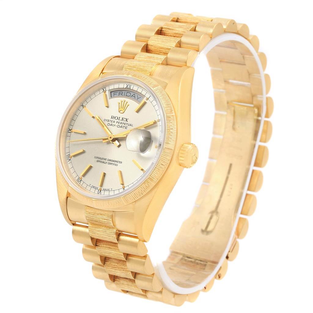 This is a Rolex President 18078 Men's Yellow Gold Silver Dial 18078 Men's Yellow Gold Silver Dial model watch showing the face, bezel, crown, and part of the gold bracelet.