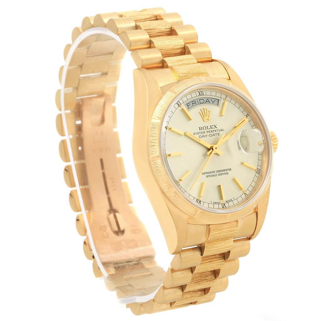 The image shows a side-angle view of the Rolex President 18078 Men's Yellow Gold Silver Dial 18078 Men's Yellow Gold Silver Dial model watch, showcasing its gold bracelet, dial, and face.