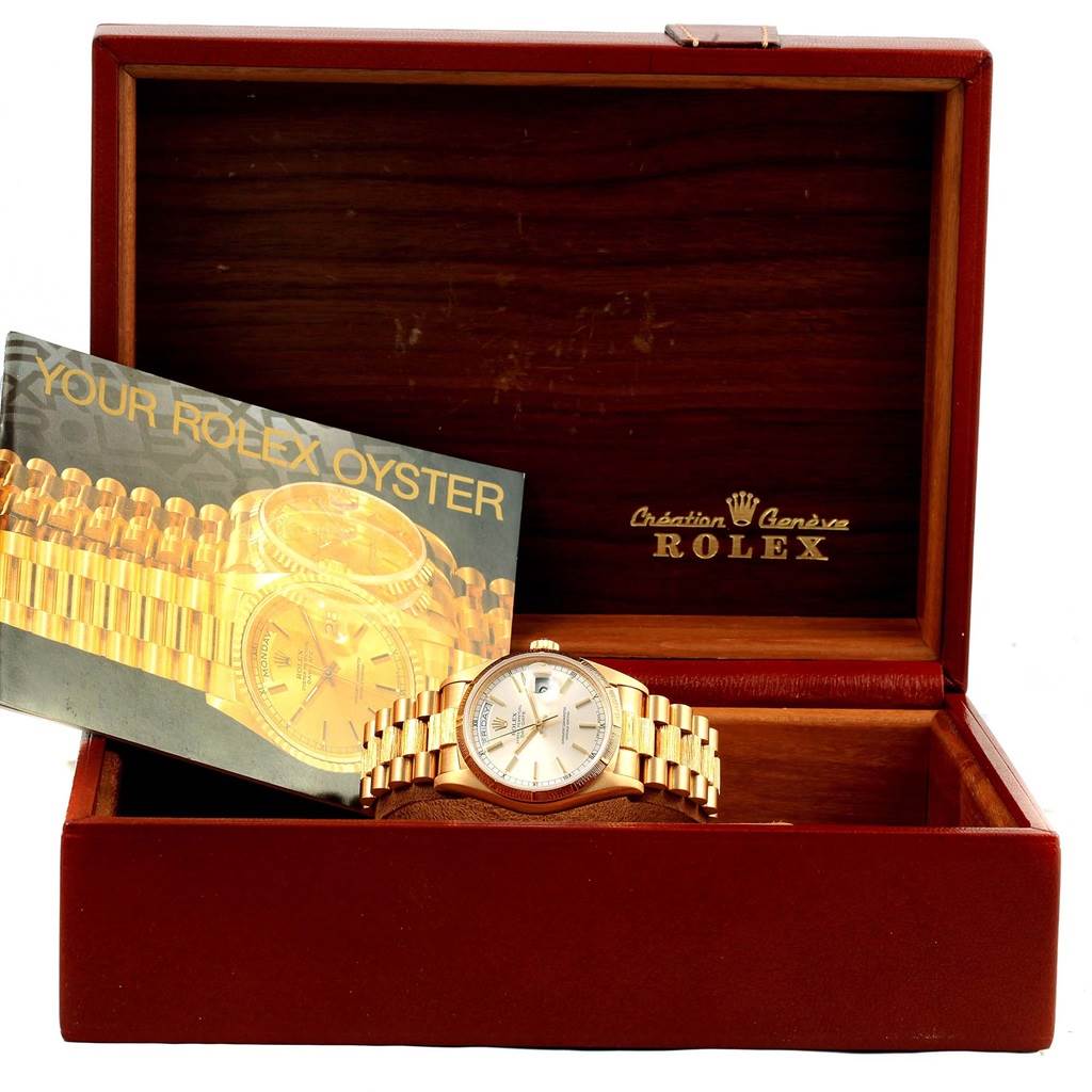 The image shows a Rolex President 18078 Men's Yellow Gold Silver Dial 18078 Men's Yellow Gold Silver Dial model watch placed inside an open wooden watch box, alongside a "Your Rolex Oyster" booklet.