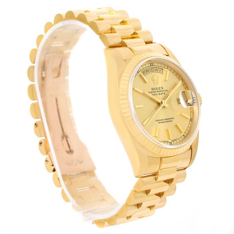 The image shows a yellow gold Rolex President 18238 Men's Yellow Gold Champagne Dial 18238 Men's Yellow Gold Champagne Dial model watch from a slight side angle, displaying the bracelet, bezel, and dial.