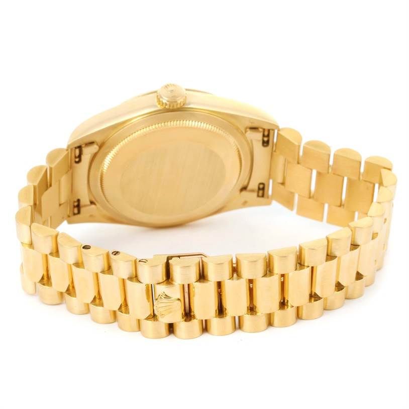 The image shows the back case and President bracelet of a Rolex President 18238 Men's Yellow Gold Champagne Dial 18238 Men's Yellow Gold Champagne Dial model watch viewed from a rear angle.