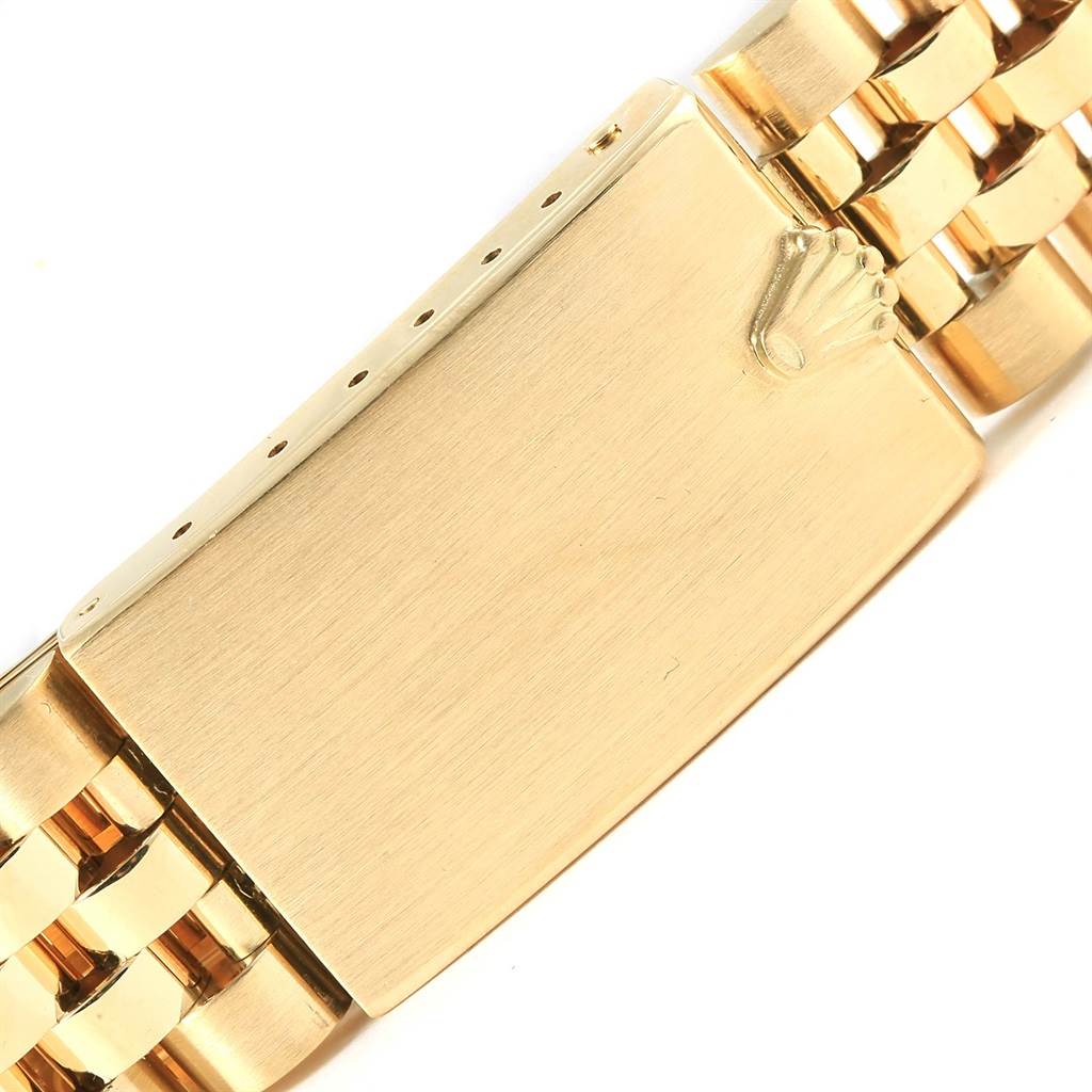 The image shows a close-up of the bracelet clasp of the Rolex President 15007 Men's Yellow Gold Champagne Dial 15007 Men's Yellow Gold Champagne Dial model watch.