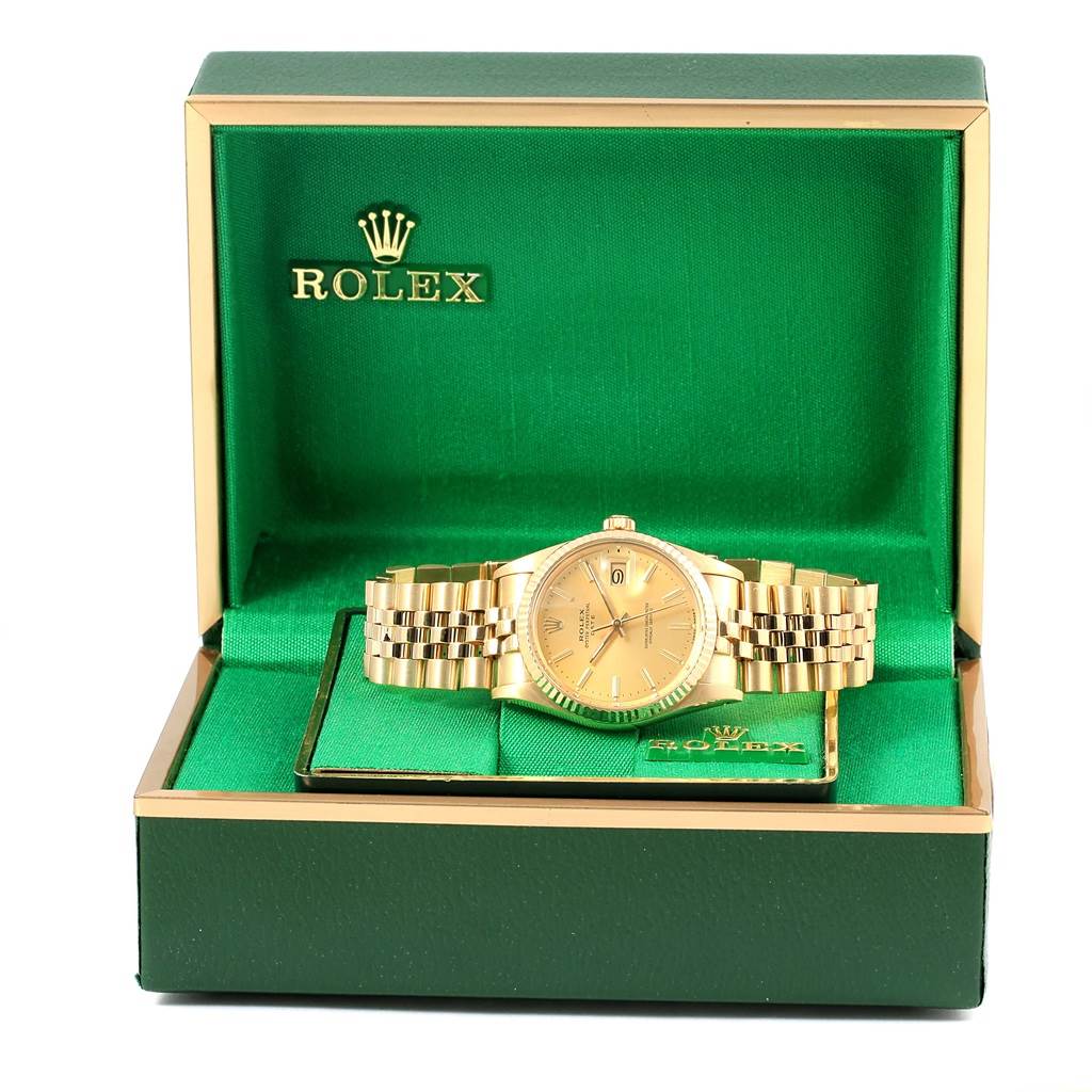 The image shows a Rolex President 15007 Men's Yellow Gold Champagne Dial 15007 Men's Yellow Gold Champagne Dial model watch from a front angle, displayed in its green and gold box.