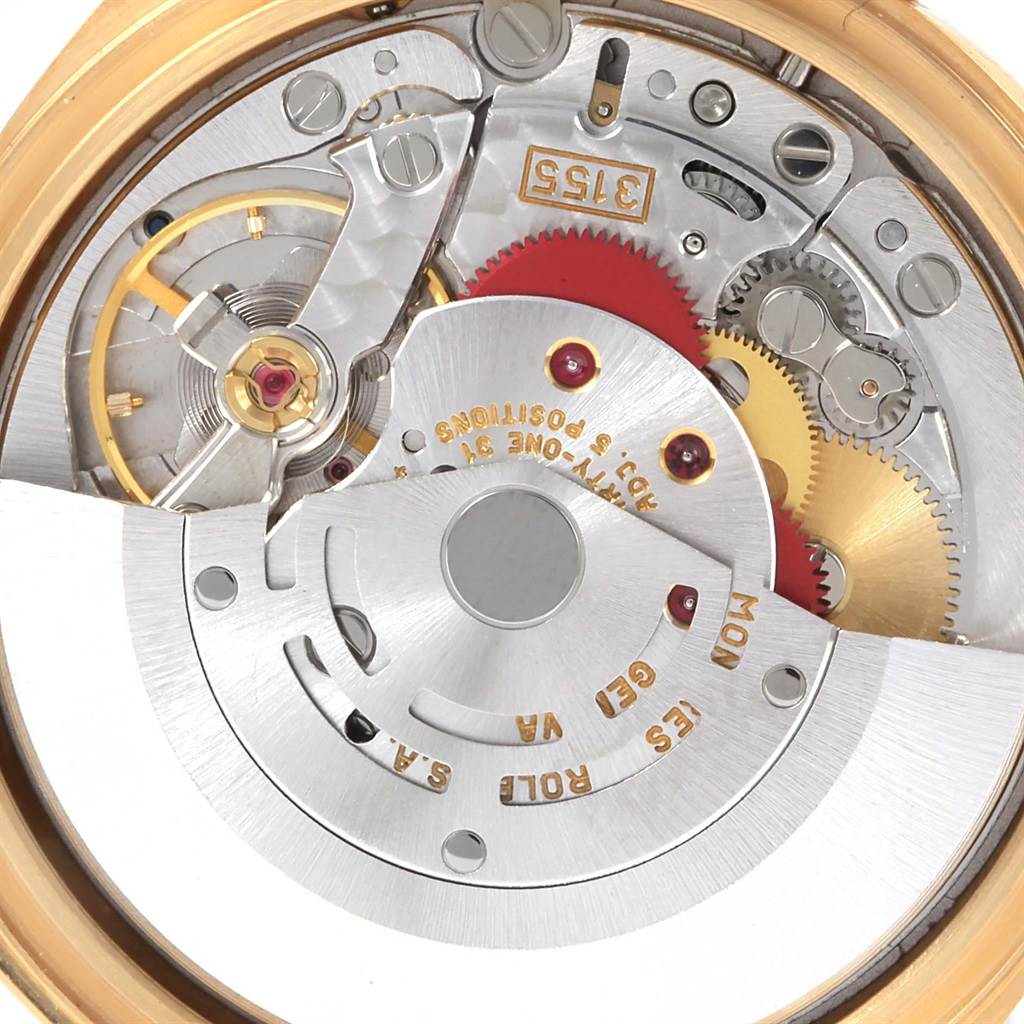 This image shows the intricate internal mechanism of a Rolex President 18238 Men's Yellow Gold Champagne Dial 18238 Men's Yellow Gold Champagne Dial model watch from a top-down angle.