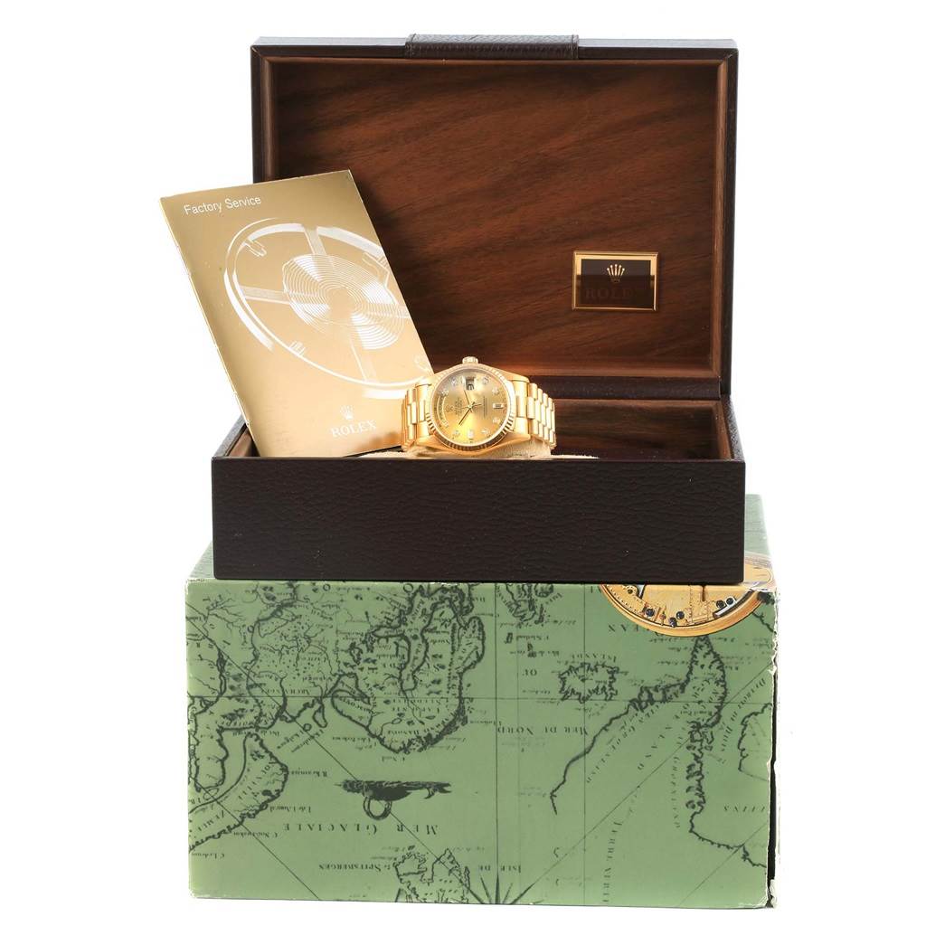 The image shows a Rolex President 18238 Men's Yellow Gold Champagne Dial 18238 Men's Yellow Gold Champagne Dial model watch displayed inside an open wooden box with a factory service manual.