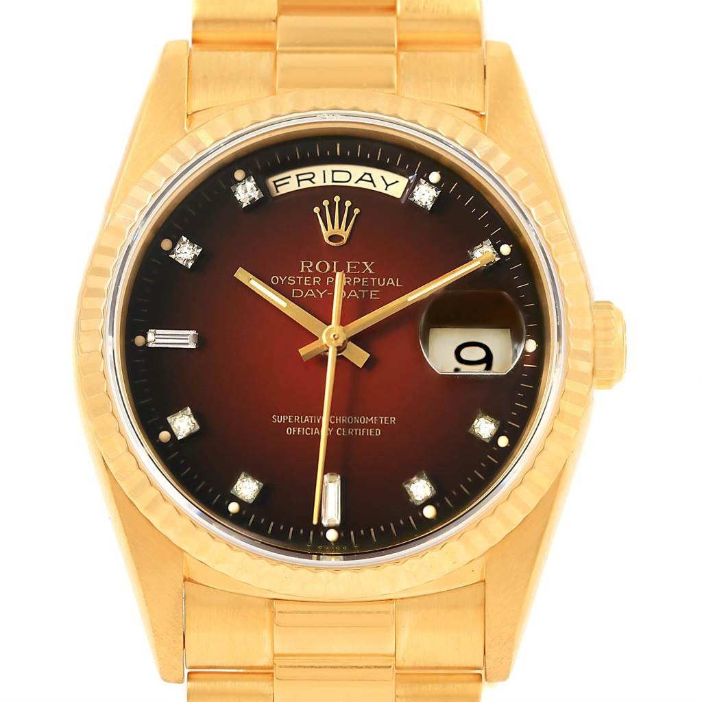 The image shows a front view of a Rolex President 18238 Men's Yellow Gold Brown Dial 18238 Men's Yellow Gold Brown Dial model watch featuring the face, day-date display, hands, and part of the bracelet.