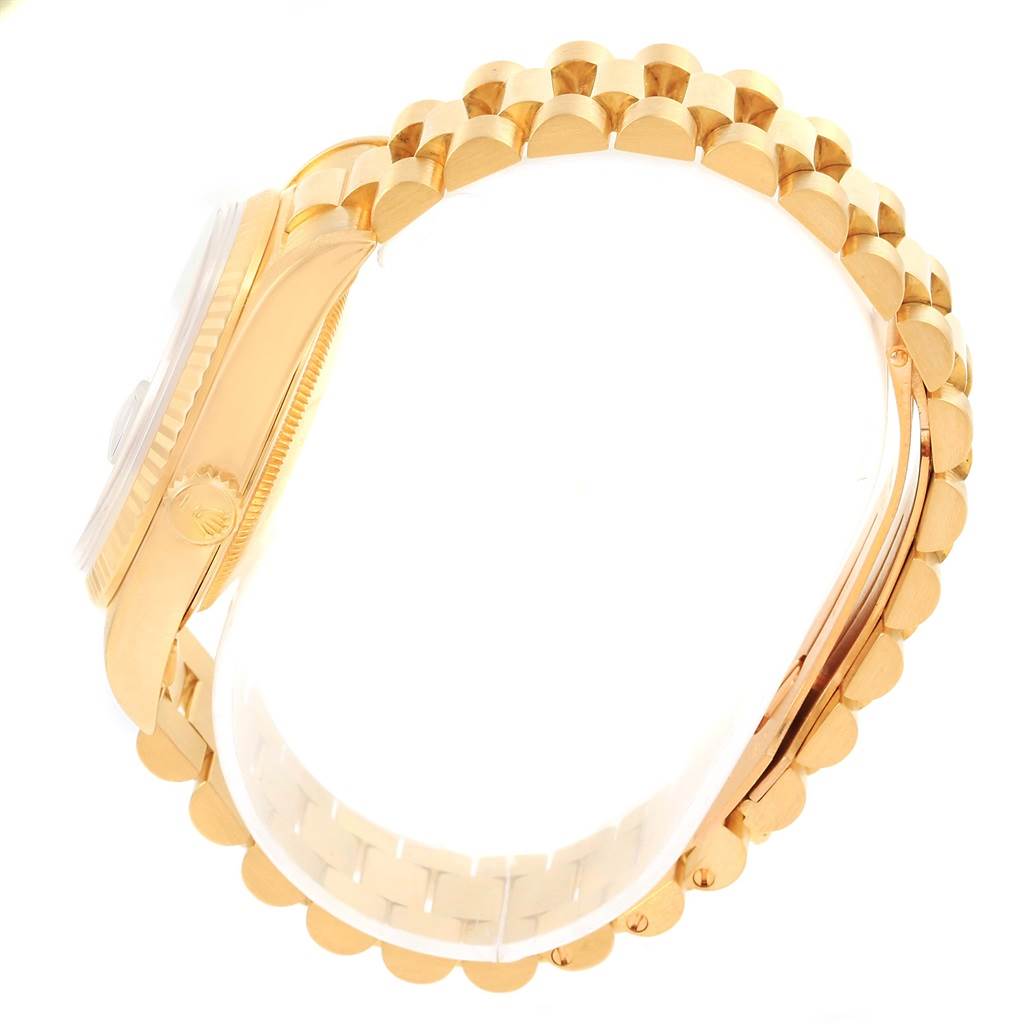 This image shows a side view of the President model Rolex watch, focusing on the case and the bracelet.