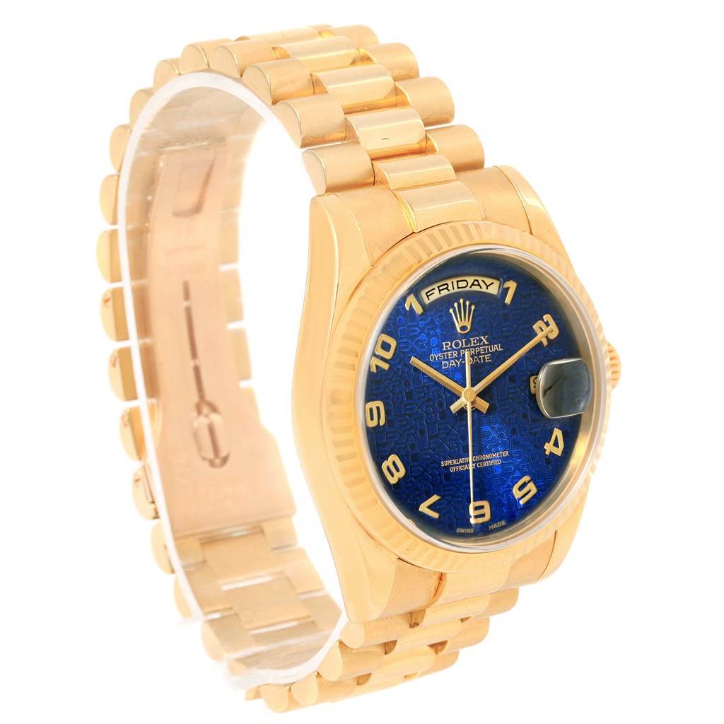 The Rolex President 118238 Men's Yellow Gold Blue Dial 118238 Men's Yellow Gold Blue Dial watch is shown at an angled side view, highlighting its gold bracelet, blue dial, and day-date display.
