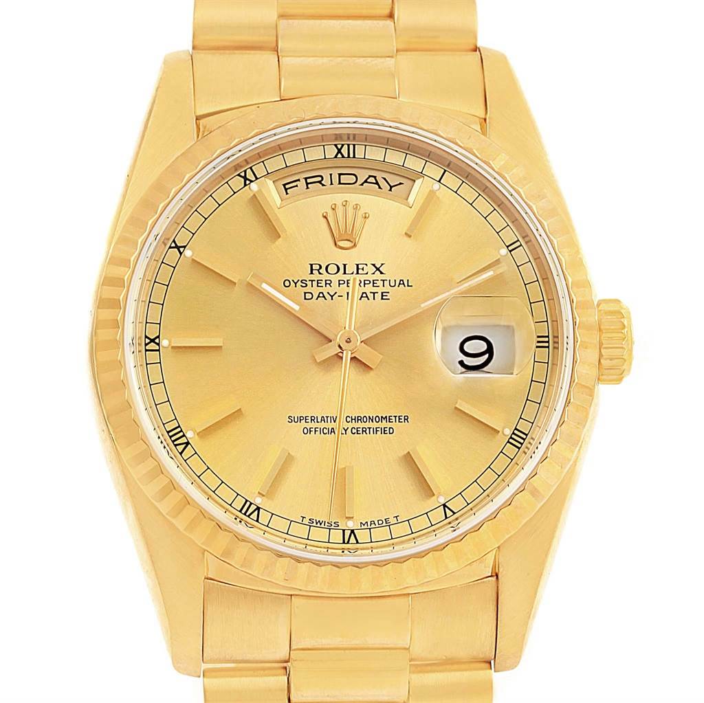 The image shows a Rolex President 18238 Men
s Yellow Gold Champagne Dial 18238 Men
s Yellow Gold Champagne Dial model watch from a top-down view, displaying the dial, hands, day-date window, and bracelet.