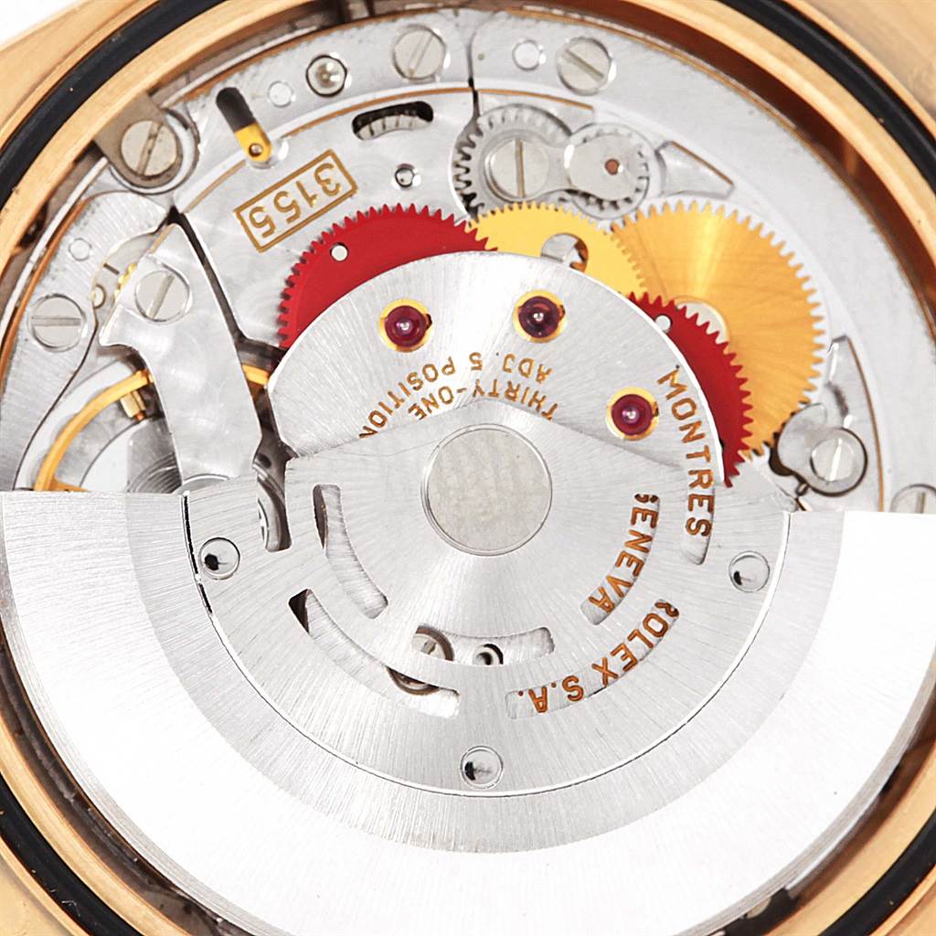 This image shows a close-up view of the movement inside a Rolex President 18238 Men
s Yellow Gold Champagne Dial 18238 Men
s Yellow Gold Champagne Dial watch.