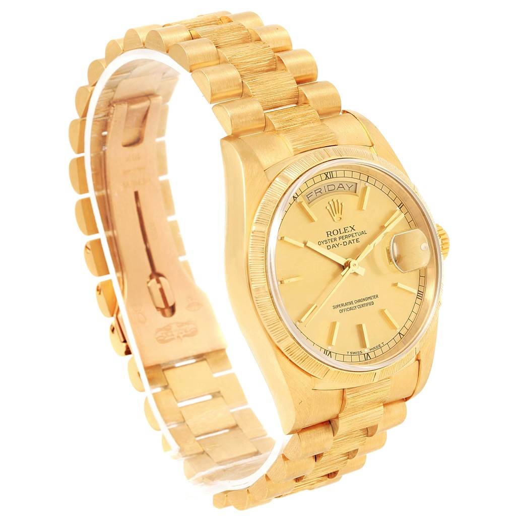 The Rolex President 18248 Men
s Yellow Gold Champagne Dial 18248 Men
s Yellow Gold Champagne Dial watch is shown at a slight angle, displaying the face, bracelet, and part of the clasp.