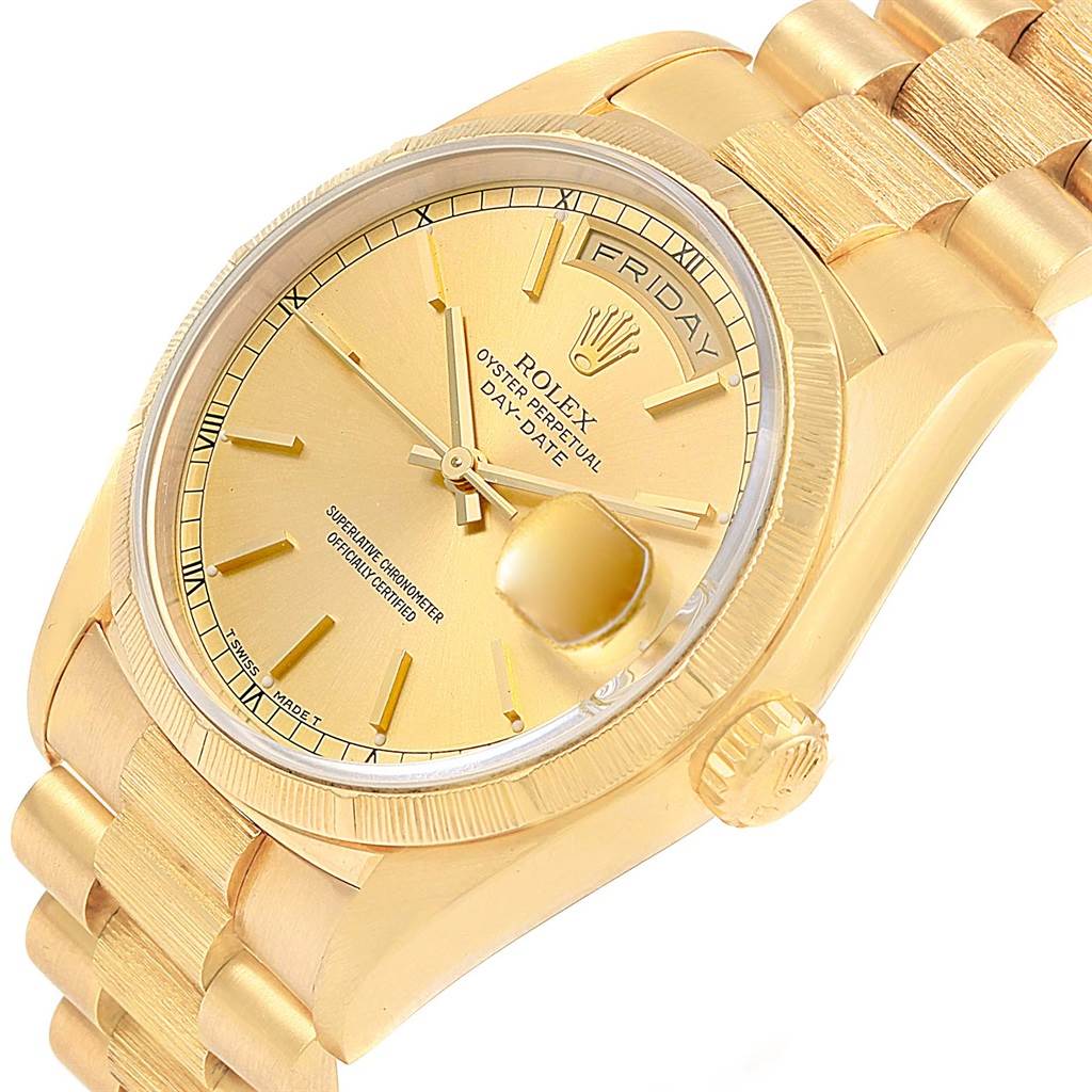 This image shows a close-up angle of the Rolex President 18248 Men
s Yellow Gold Champagne Dial 18248 Men
s Yellow Gold Champagne Dial model watch, displaying the dial, crown, and part of the bracelet.