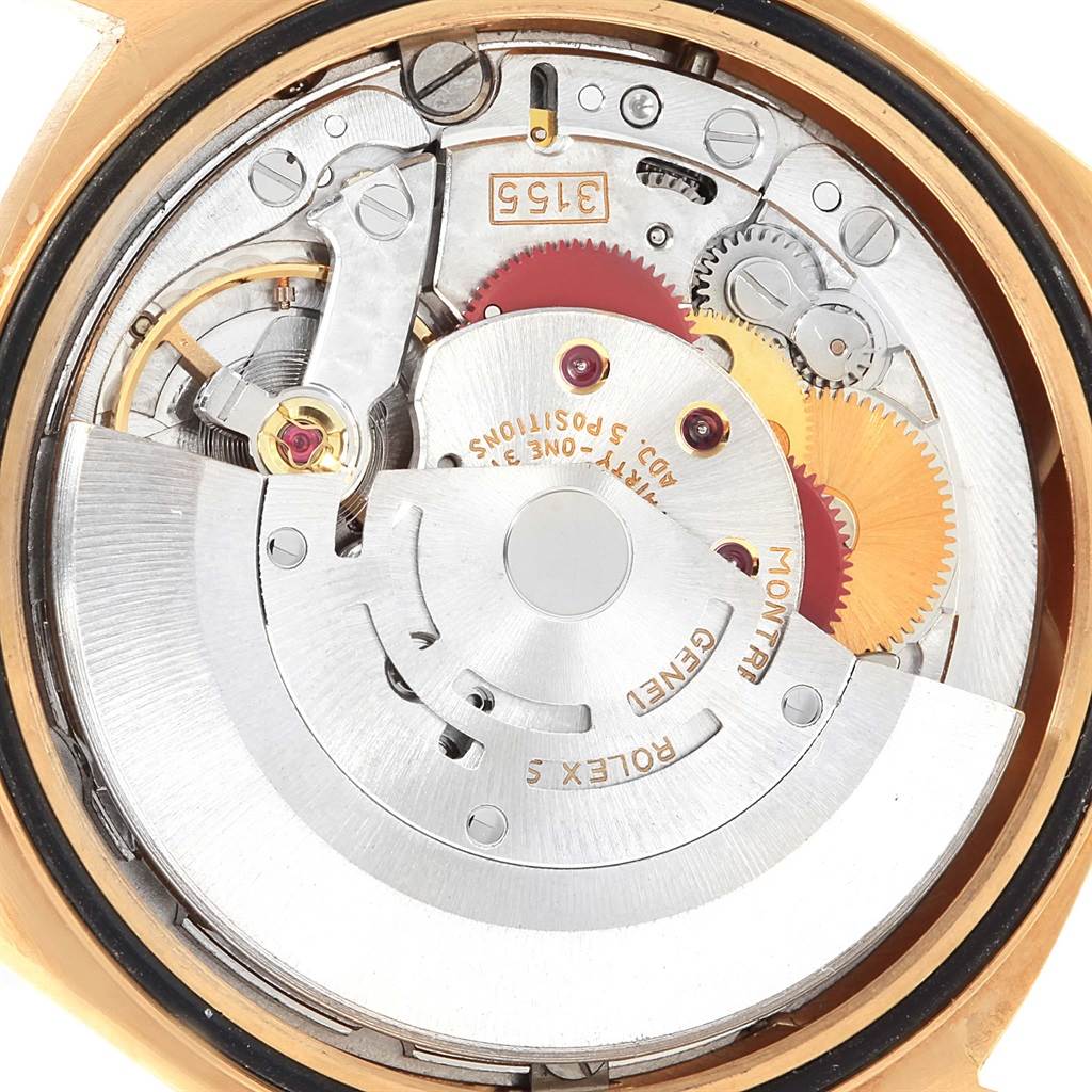 The image shows the internal mechanism of the Rolex President 18248 Men
s Yellow Gold Champagne Dial 18248 Men
s Yellow Gold Champagne Dial model, viewed from the back case with gears and components visible.