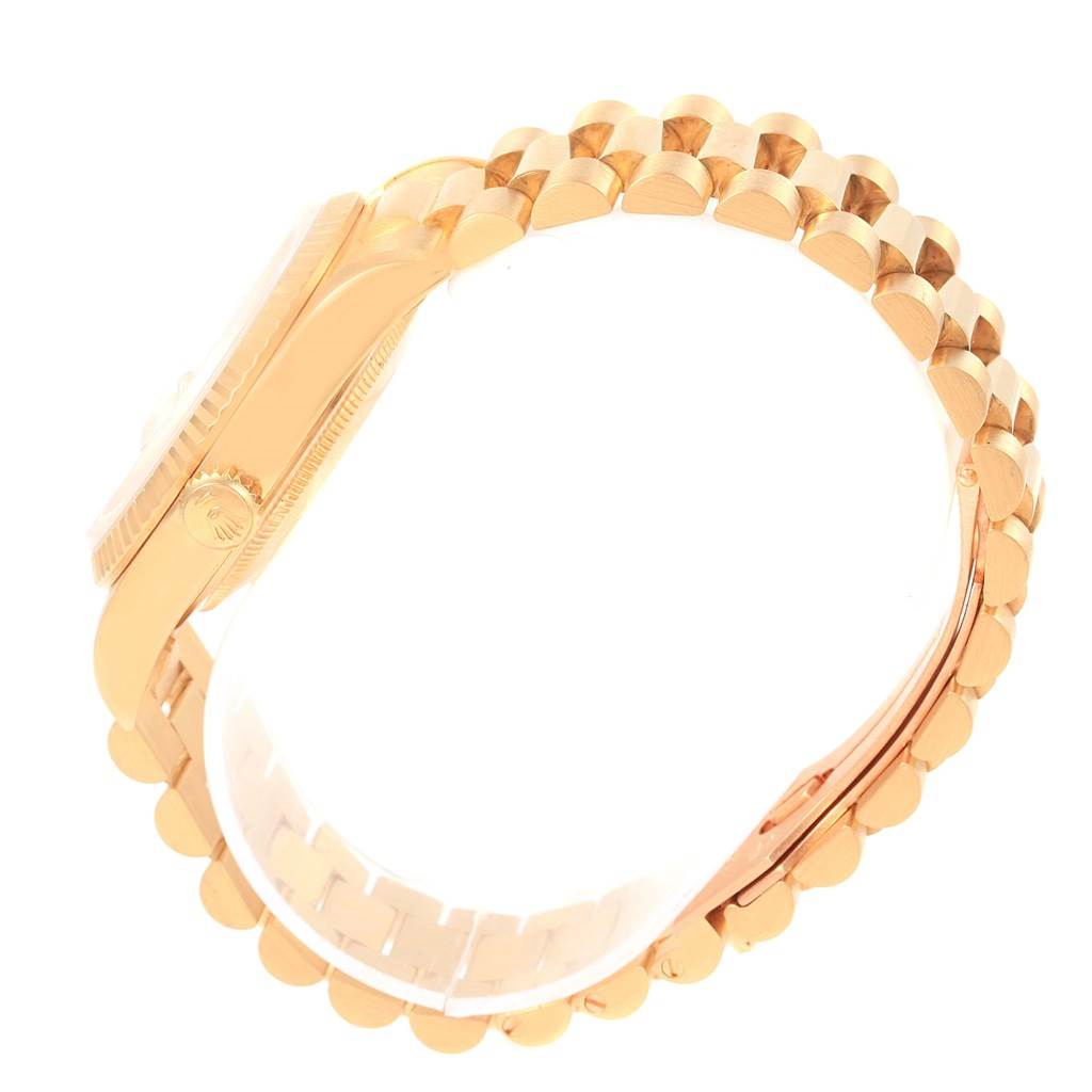 The image shows a side view of a Rolex President 18238 Men
s Yellow Gold White Dial 18238 Men
s Yellow Gold White Dial model watch, highlighting the case, crown, and bracelet.