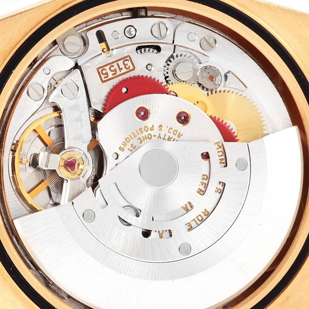 The image shows the internal mechanism and components of the Rolex President 18238 Men
s Yellow Gold White Dial 18238 Men
s Yellow Gold White Dial model watch from a close-up, top-down angle.