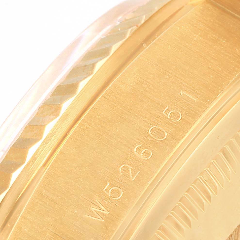 The image shows a close-up of the serial number engraving on the case side of a Rolex President 18238 Men
s Yellow Gold White Dial 18238 Men
s Yellow Gold White Dial model watch.