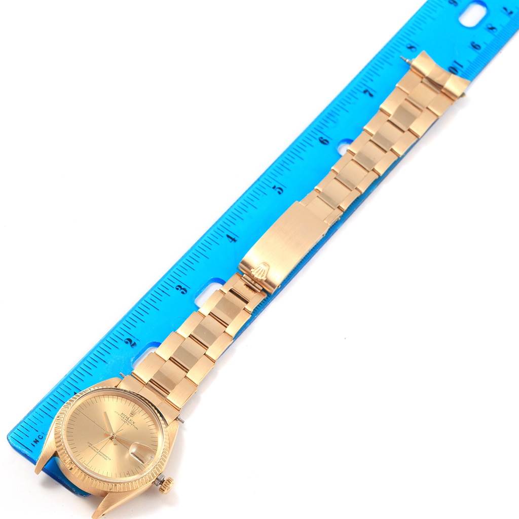 The image shows a Rolex President 1503 Men's Yellow Gold Champagne Dial 1503 Men's Yellow Gold Champagne Dial model watch laid flat next to a ruler, displaying the bracelet and face clearly.