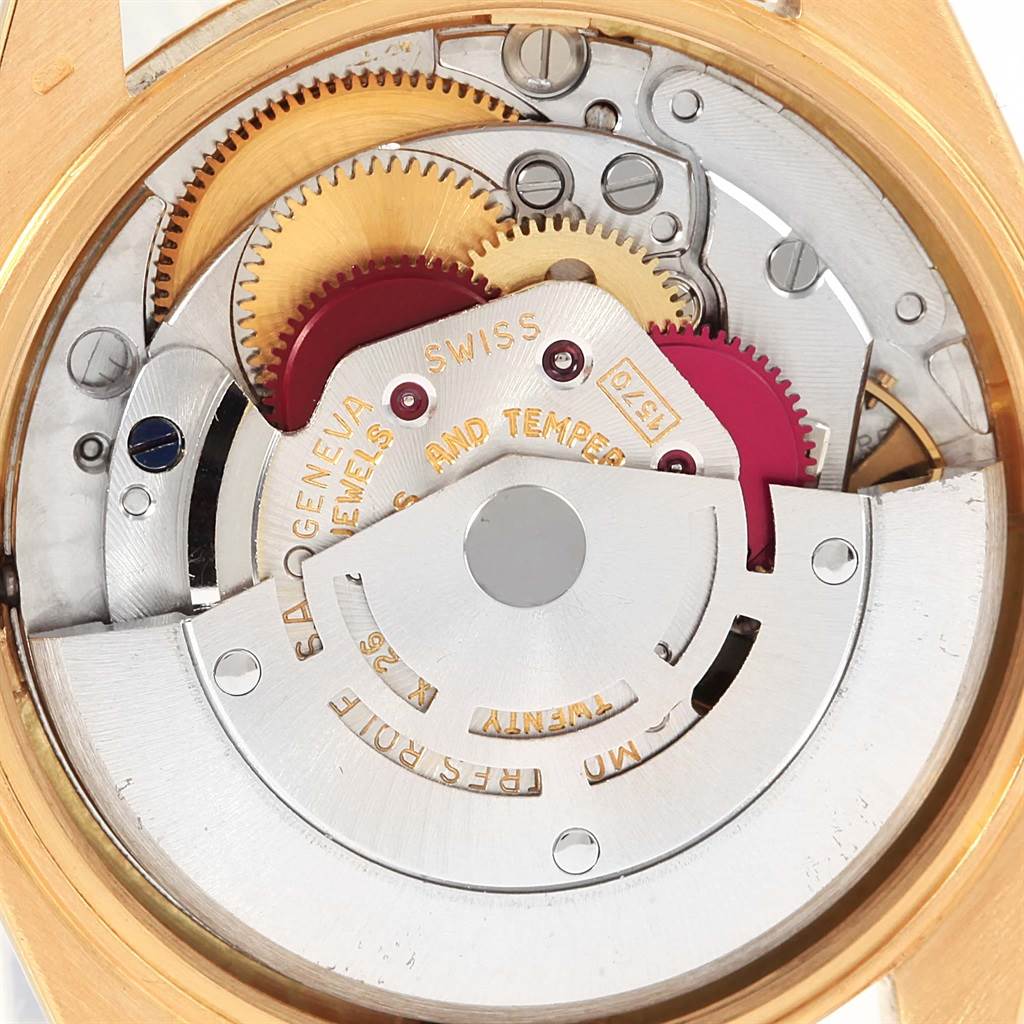 This is a close-up view of the movement mechanism of a Rolex President 1503 Men's Yellow Gold Champagne Dial 1503 Men's Yellow Gold Champagne Dial model watch, showcasing its intricate gears and components.