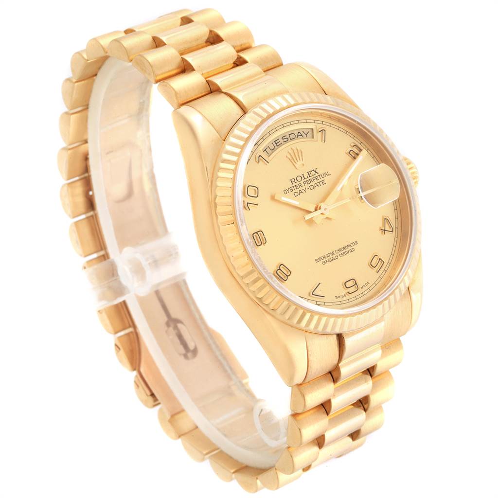 The image shows a side angle of a Rolex President 118238 Men
s Yellow Gold Champagne Dial 118238 Men
s Yellow Gold Champagne Dial model watch, highlighting its gold case, fluted bezel, and President bracelet.