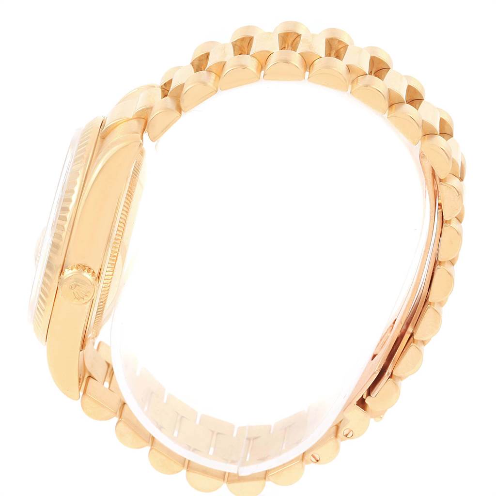 The image shows a side view angle of a Rolex President 118238 Men
s Yellow Gold Champagne Dial 118238 Men
s Yellow Gold Champagne Dial model watch, highlighting the case and bracelet.