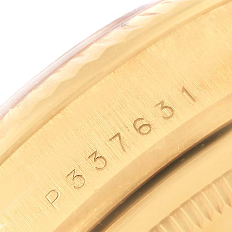 The image shows a close-up angle of the case side with the serial number of the Rolex President 118238 Men
s Yellow Gold Champagne Dial 118238 Men
s Yellow Gold Champagne Dial model watch.