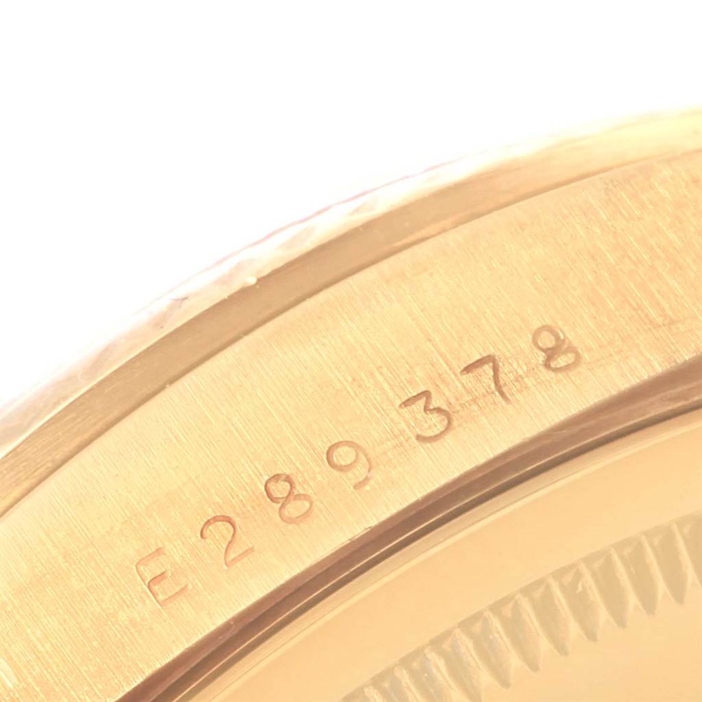 The image shows a close-up angle of the serial number engraved on the case of a Rolex President 18238 Men's Yellow Gold Beige Dial 18238 Men's Yellow Gold Beige Dial model watch.