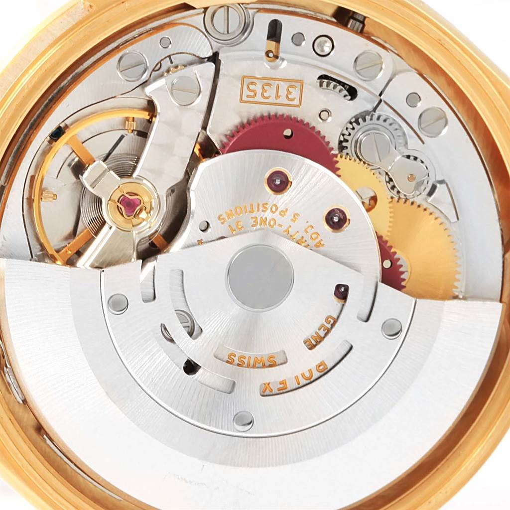 This image shows the intricate internal mechanism of a Rolex President 15238 Men
s Yellow Gold Champagne Dial 15238 Men
s Yellow Gold Champagne Dial model, including gears and the rotor, viewed from the back.