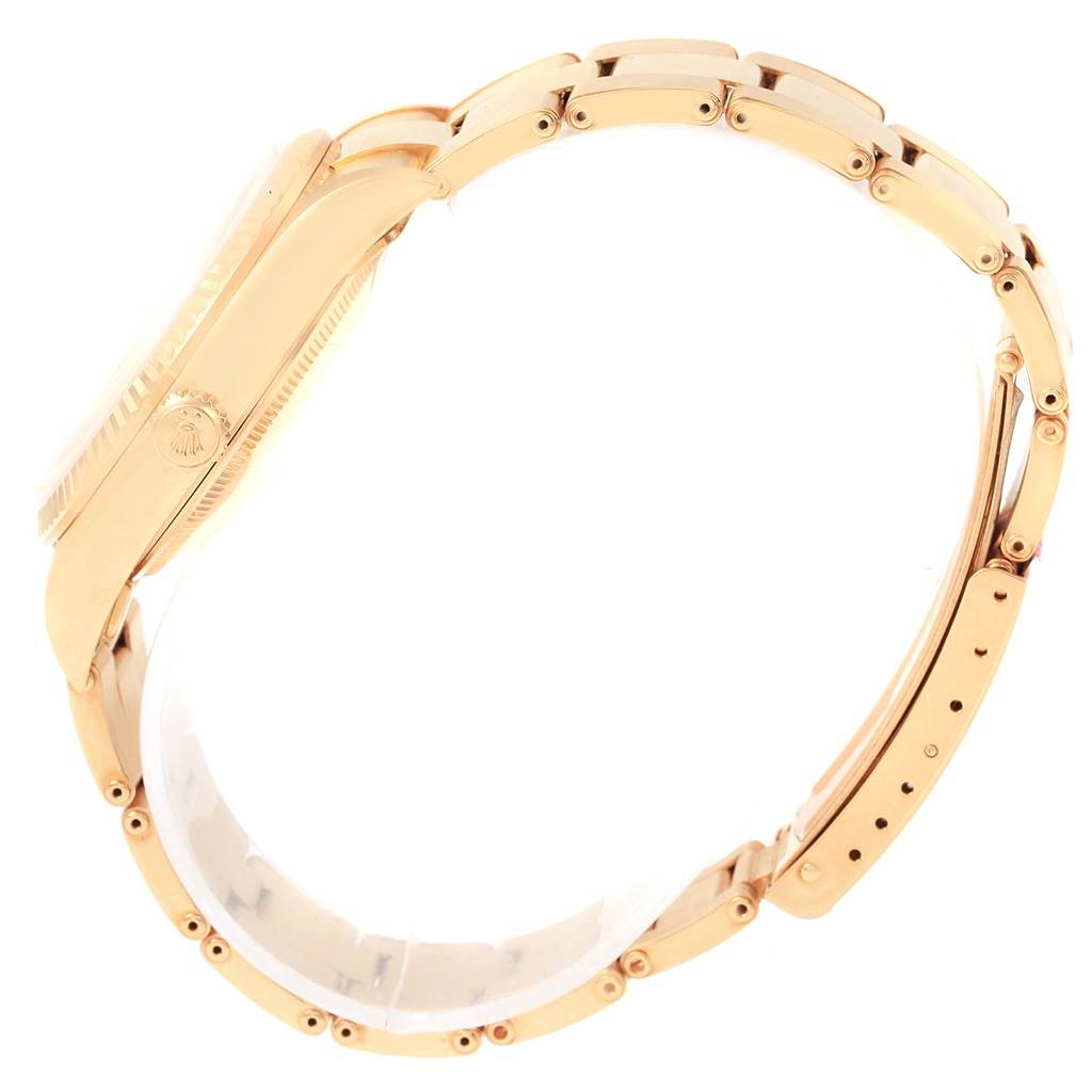 The image shows a Rolex President 15238 Men
s Yellow Gold Champagne Dial 15238 Men
s Yellow Gold Champagne Dial model watch from a side angle, highlighting its gold case and bracelet.