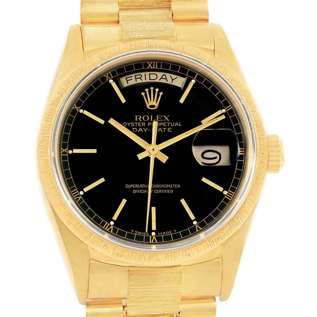 This image shows a front view of a Rolex President 18078 Men
s Yellow Gold Black Dial 18078 Men
s Yellow Gold Black Dial model watch, displaying the face, bezel, and part of the bracelet.