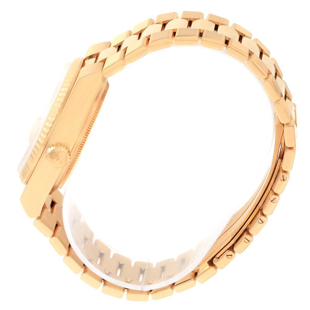 The image shows a side view of a Rolex President 19018 Men's Yellow Gold Champagne Dial 19018 Men's Yellow Gold Champagne Dial model watch, displaying its gold case and linked bracelet.