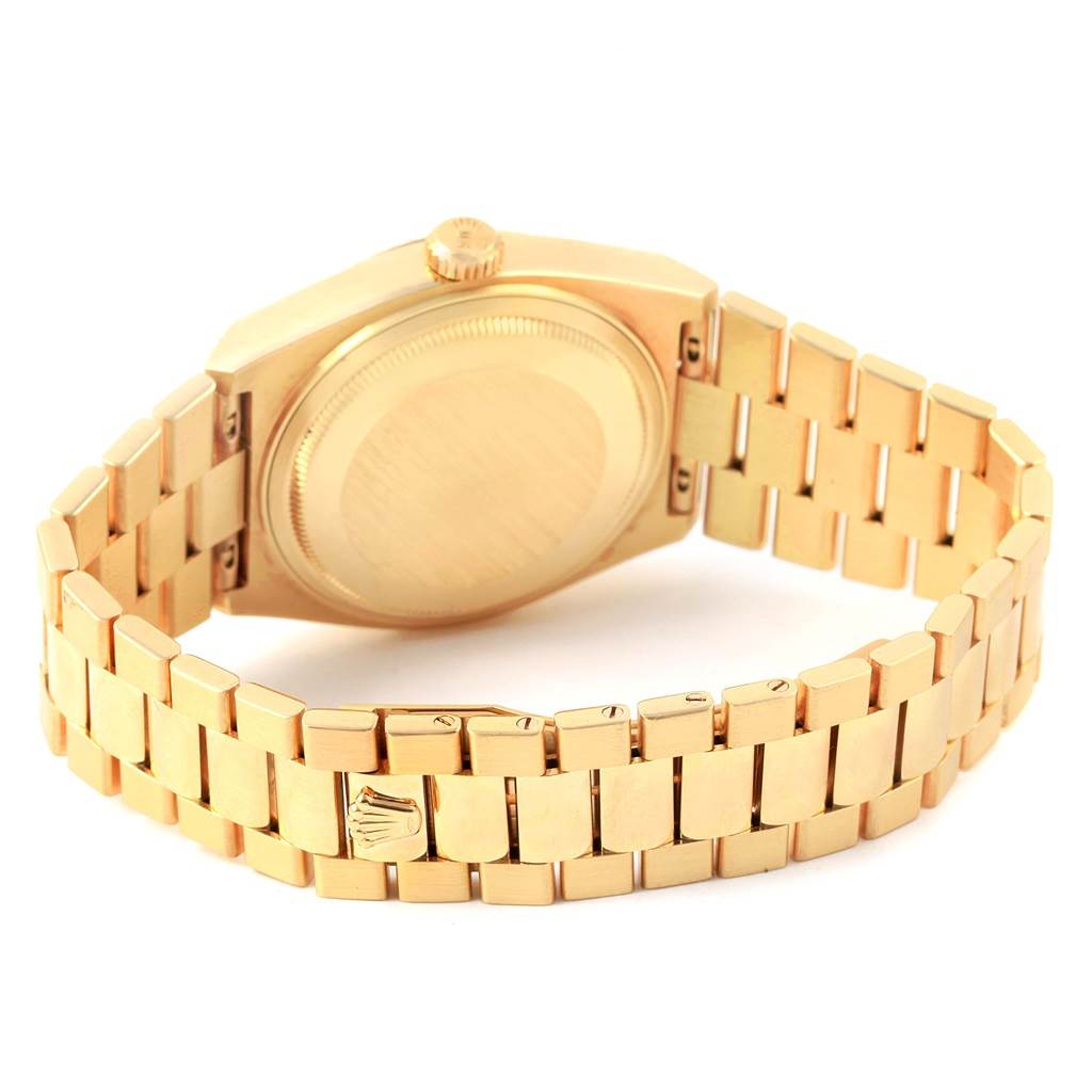The image shows the back case and bracelet of a Rolex President 19018 Men's Yellow Gold Champagne Dial 19018 Men's Yellow Gold Champagne Dial model watch from an angled rear view.