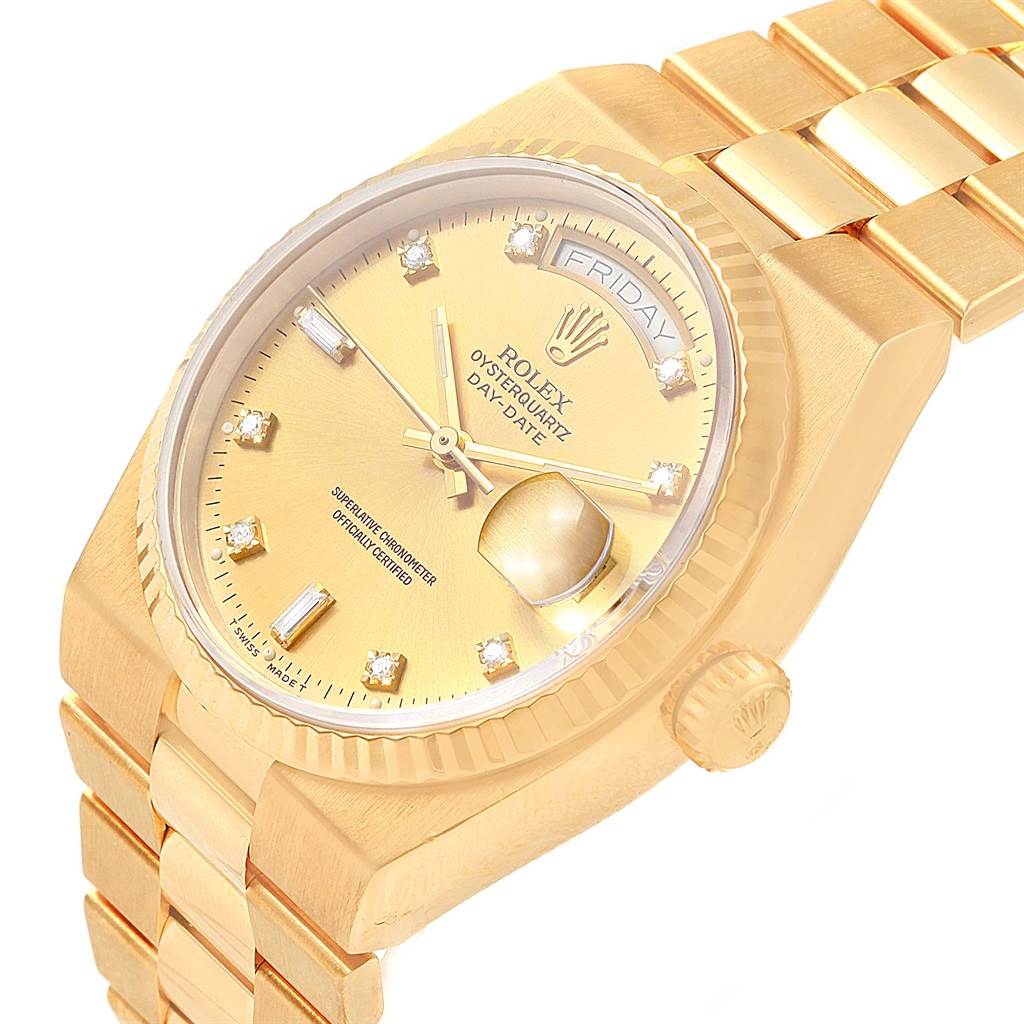 This image shows a close-up, angled view of the dial, case, and part of the bracelet of a Rolex President 19018 Men's Yellow Gold Champagne Dial 19018 Men's Yellow Gold Champagne Dial.