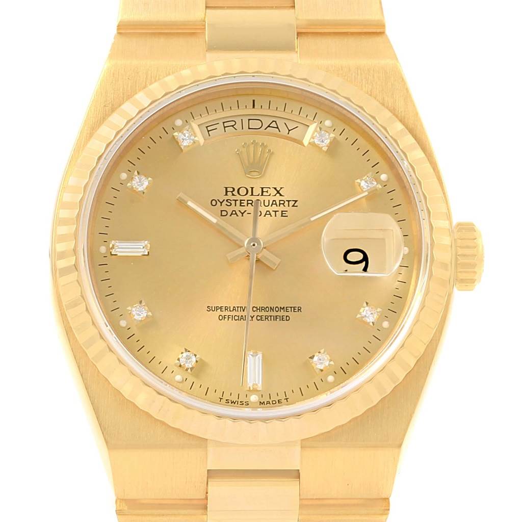 The image shows a frontal view of a Rolex Oysterquartz Day-Date President model, highlighting the dial, bezel, and part of the bracelet.
