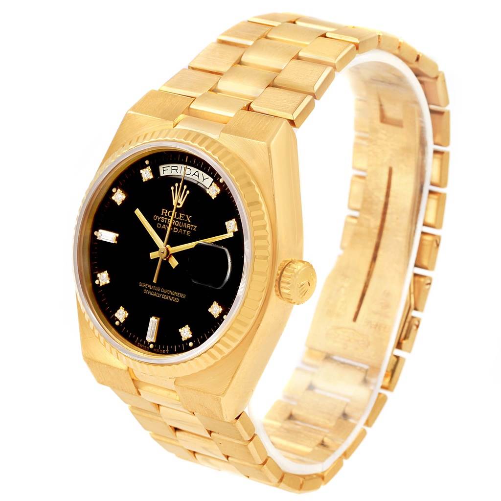 The Rolex President 19018 Men's Yellow Gold Black Dial 19018 Men's Yellow Gold Black Dial watch is shown at a slight side angle, displaying its gold band, black dial, and day-date feature.