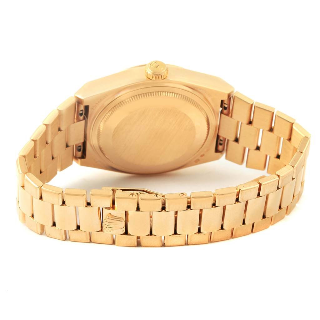 This image shows the back and bracelet of a Rolex President 19018 Men's Yellow Gold Black Dial 19018 Men's Yellow Gold Black Dial model watch from a rear angle.