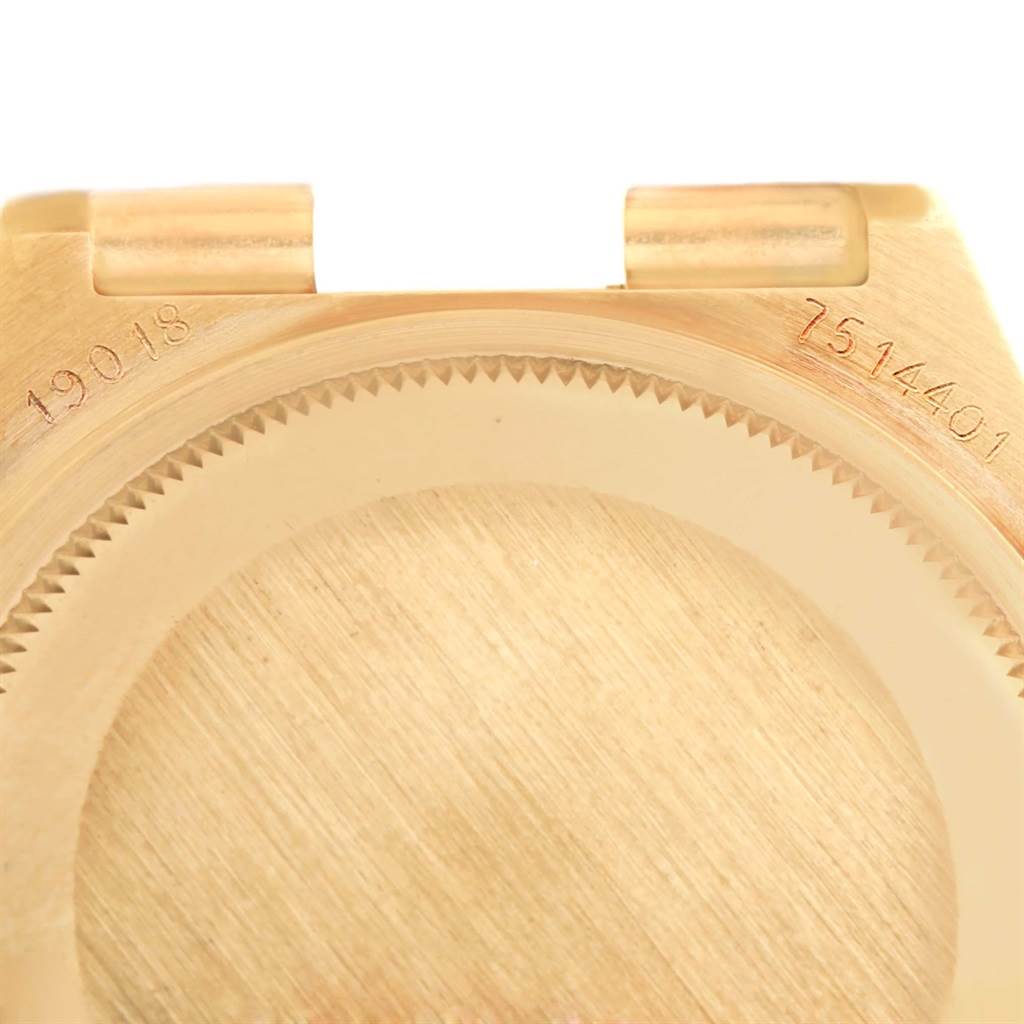 This image shows a close-up of the back case and lugs of a Rolex President 19018 Men's Yellow Gold Black Dial 19018 Men's Yellow Gold Black Dial model watch.