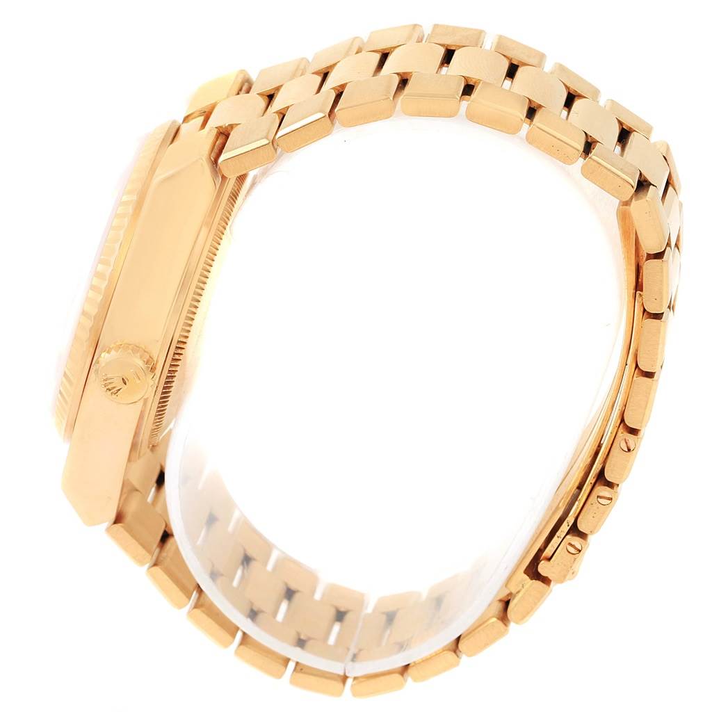 The image shows a side view of the gold case and band of the Rolex President 19018 Men's Yellow Gold Black Dial 19018 Men's Yellow Gold Black Dial model watch.