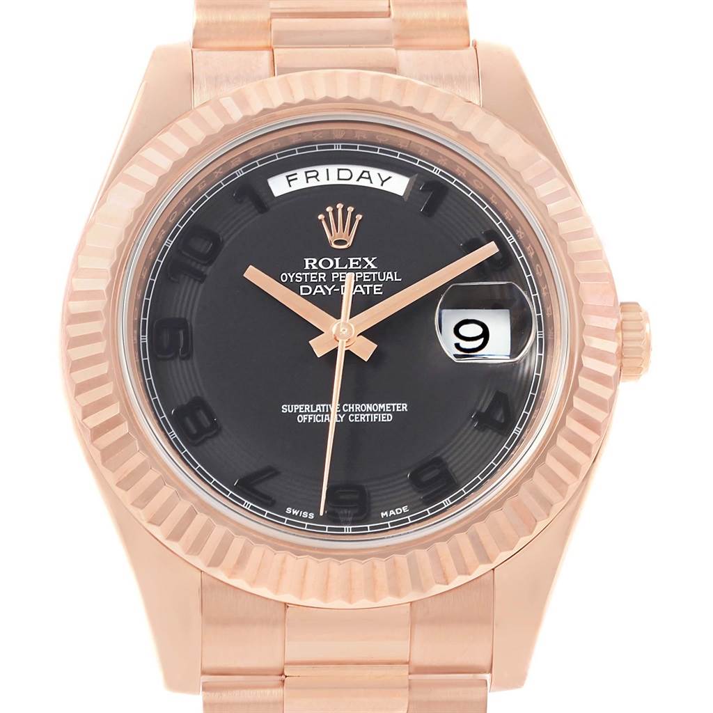 The image shows a close-up front view of a Rolex President 218235 Men's Rose Gold Black Dial 218235 Men's Rose Gold Black Dial watch, highlighting its dial, hands, day, and date display.