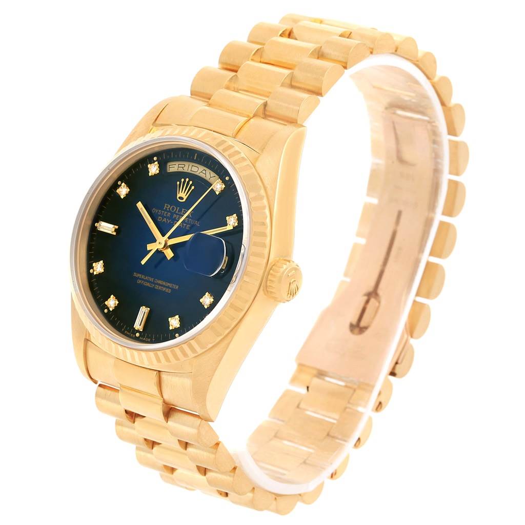 The Rolex President 18238 Men's Yellow Gold Blue Dial 18238 Men's Yellow Gold Blue Dial model watch is shown at a three-quarter angle, displaying the gold band, blue dial, and crown.
