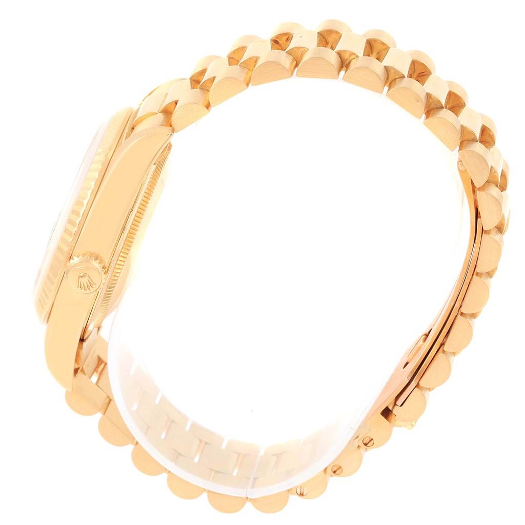 The image features a Rolex President 18238 Men's Yellow Gold Blue Dial 18238 Men's Yellow Gold Blue Dial model watch shown from the side, highlighting its gold case and bracelet.