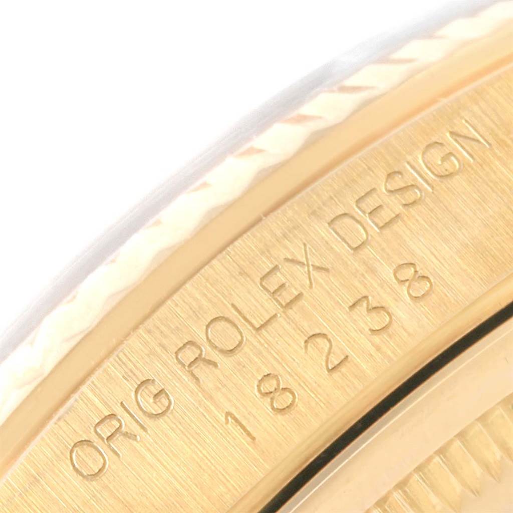 The image shows the engraved side of the case back of the Rolex President 18238 Men's Yellow Gold Blue Dial 18238 Men's Yellow Gold Blue Dial model.