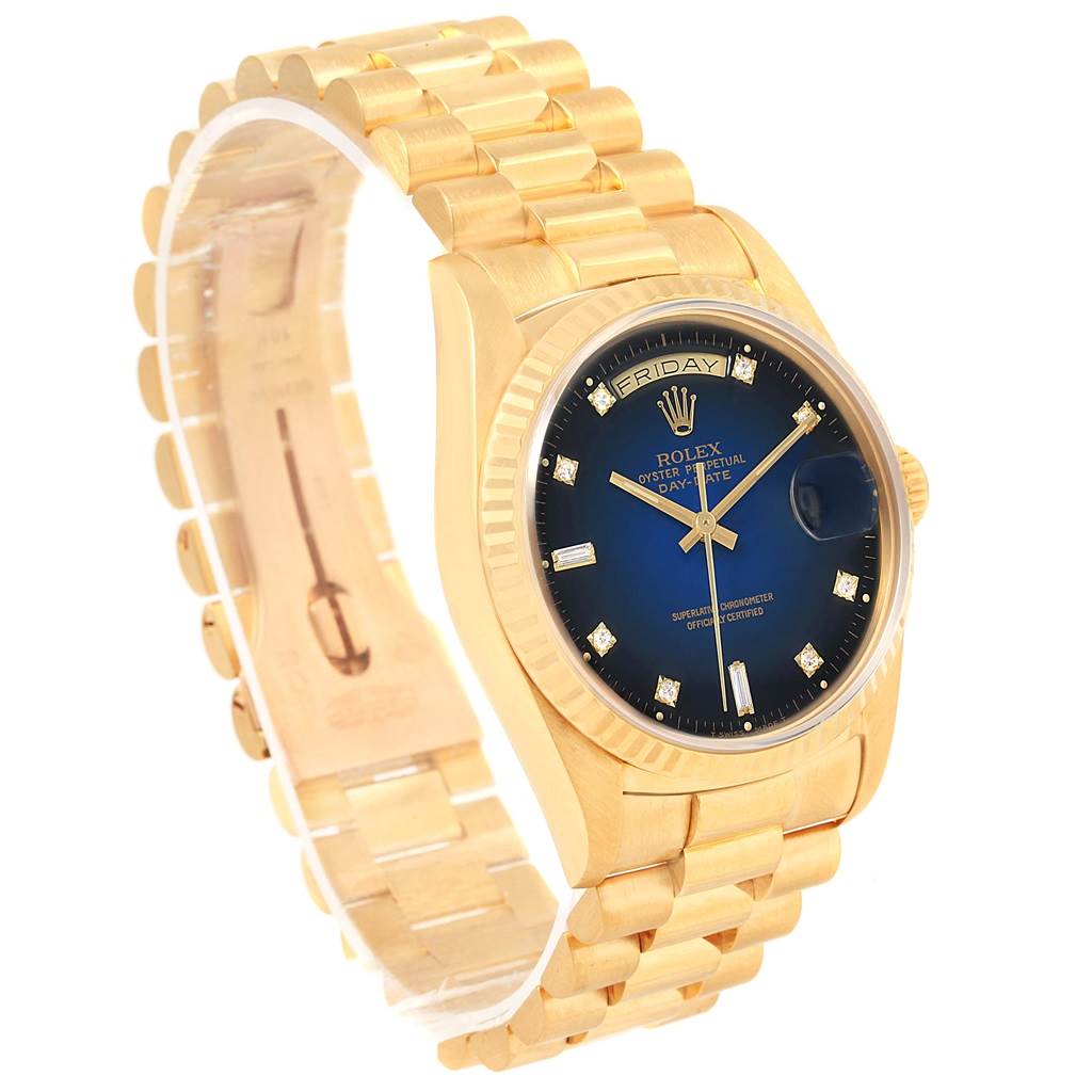 The Rolex President 18238 Men's Yellow Gold Blue Dial 18238 Men's Yellow Gold Blue Dial model watch is shown at a three-quarter angle, highlighting its gold bracelet, blue dial, and day-date display.