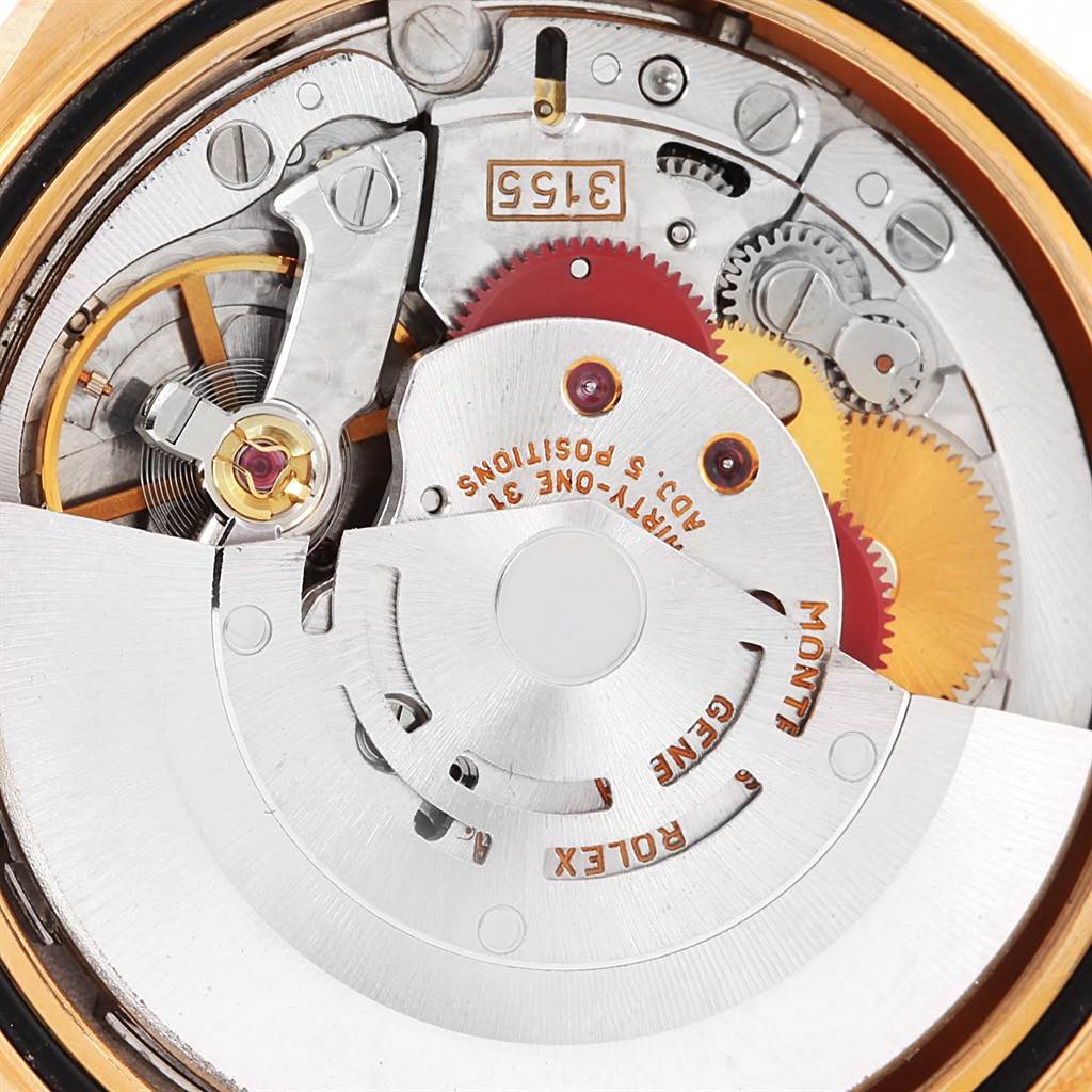 This image shows the intricate internal mechanical movement of a Rolex President 18238 Men's Yellow Gold Blue Dial 18238 Men's Yellow Gold Blue Dial model watch.