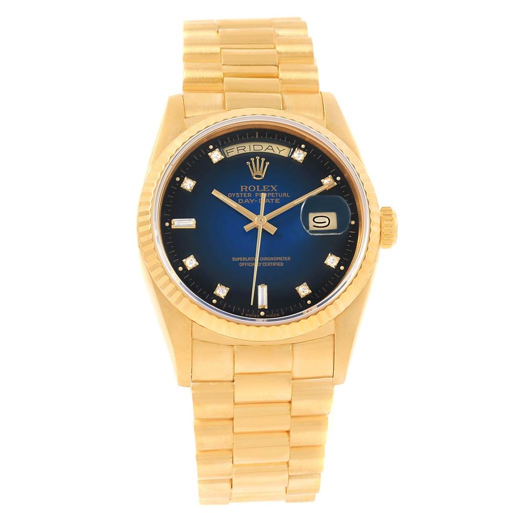 The Rolex President 18238 Men's Yellow Gold Blue Dial 18238 Men's Yellow Gold Blue Dial model is shown from the front, displaying the blue dial, gold case, fluted bezel, and gold bracelet.