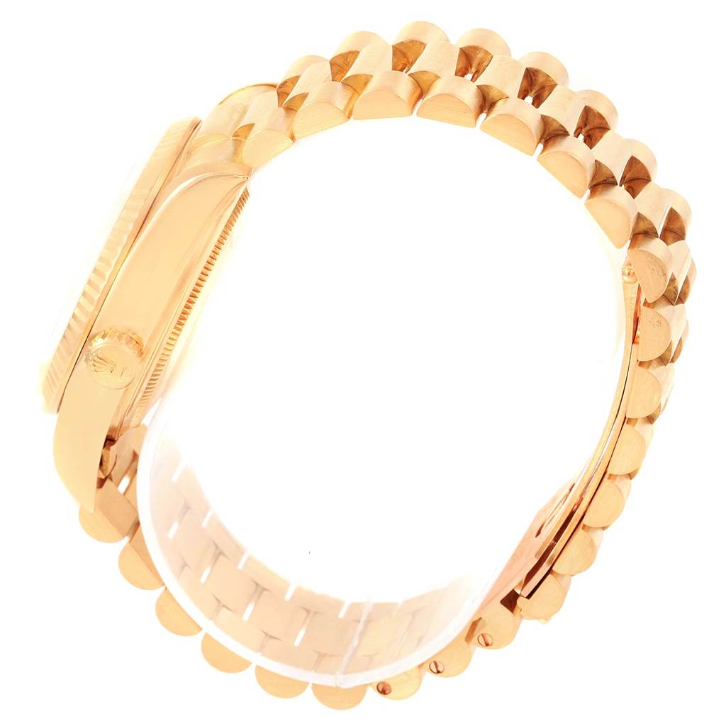 The image shows a side view of the Rolex President 18038 Men's Yellow Gold Silver Dial 18038 Men's Yellow Gold Silver Dial model, highlighting the band and case.