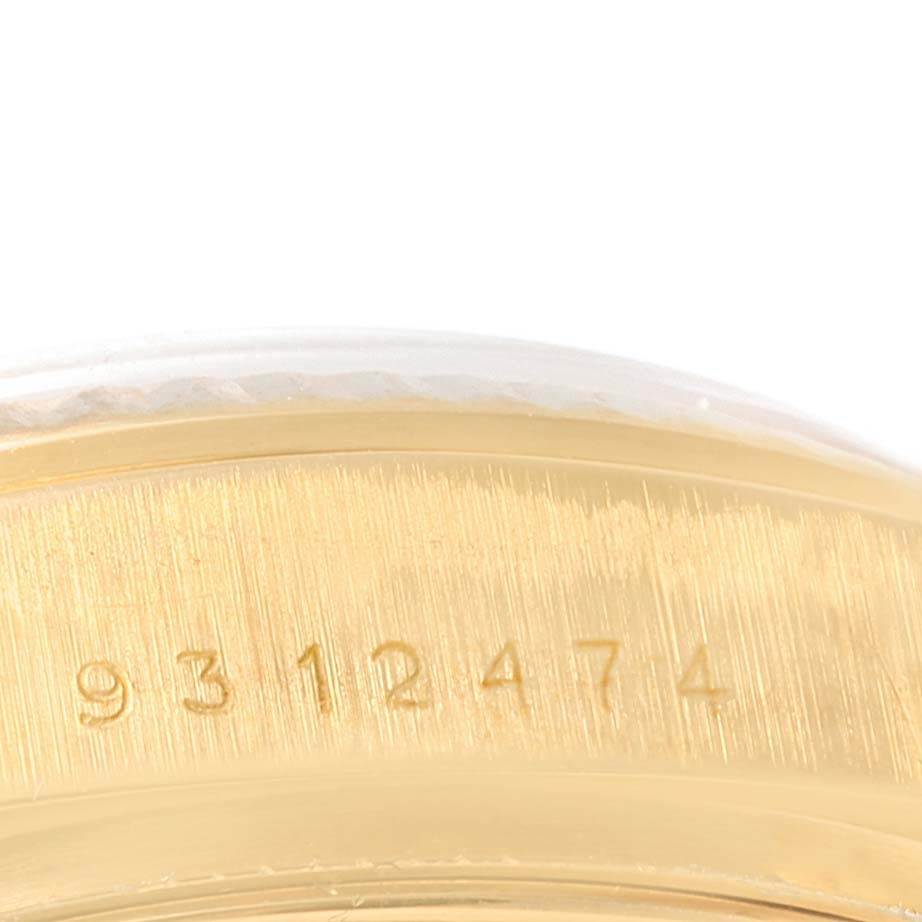 This close-up image shows the engraved serial number on the gold case of a Rolex President 18038 Men's Yellow Gold White Dial 18038 Men's Yellow Gold White Dial model watch.