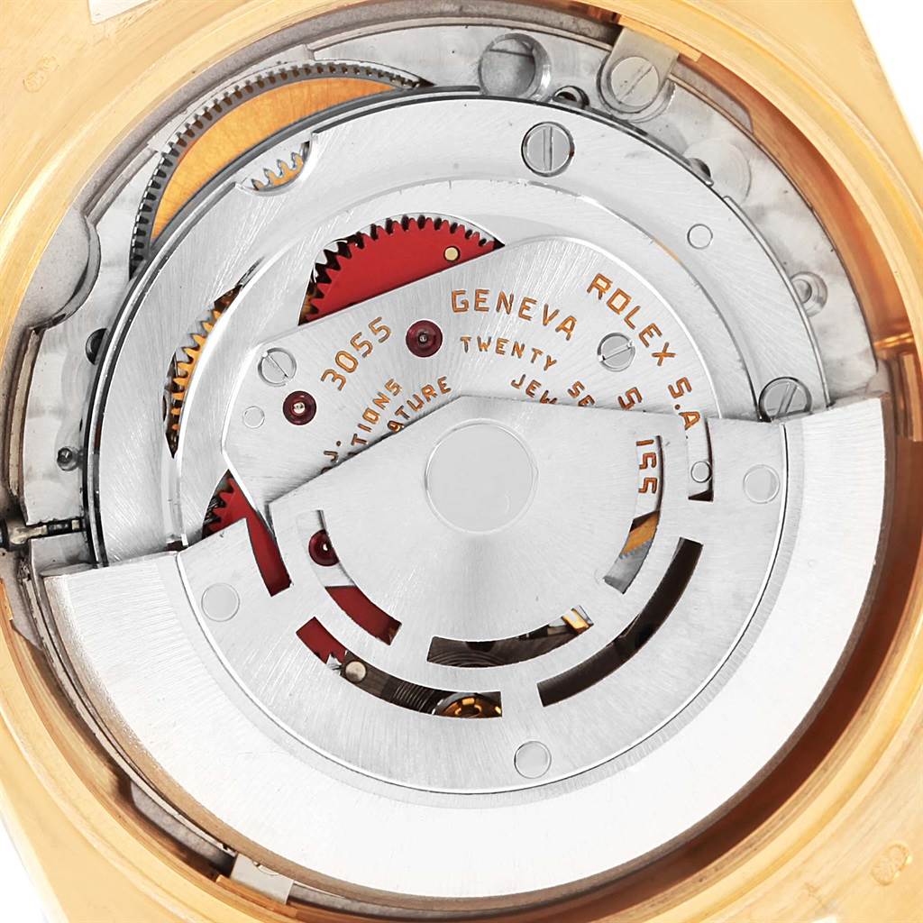 This image shows the inner mechanism of a Rolex President 18038 Men's Yellow Gold White Dial 18038 Men's Yellow Gold White Dial model watch, highlighting the movement and rotor.