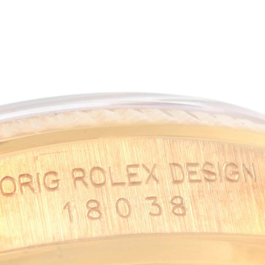 The image shows the side view of a Rolex President 18038 Men's Yellow Gold White Dial 18038 Men's Yellow Gold White Dial model watch with the etched text "ORIG ROLEX DESIGN 18038."
