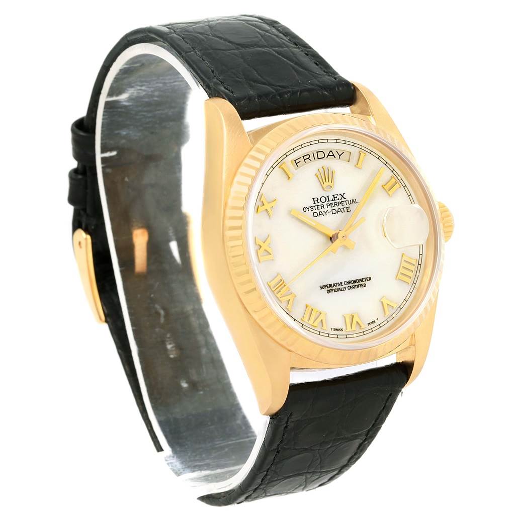 The image shows a Rolex President 18038 Men's Yellow Gold White Dial 18038 Men's Yellow Gold White Dial model watch at a three-quarter angle, highlighting its face, gold case, and black leather strap.
